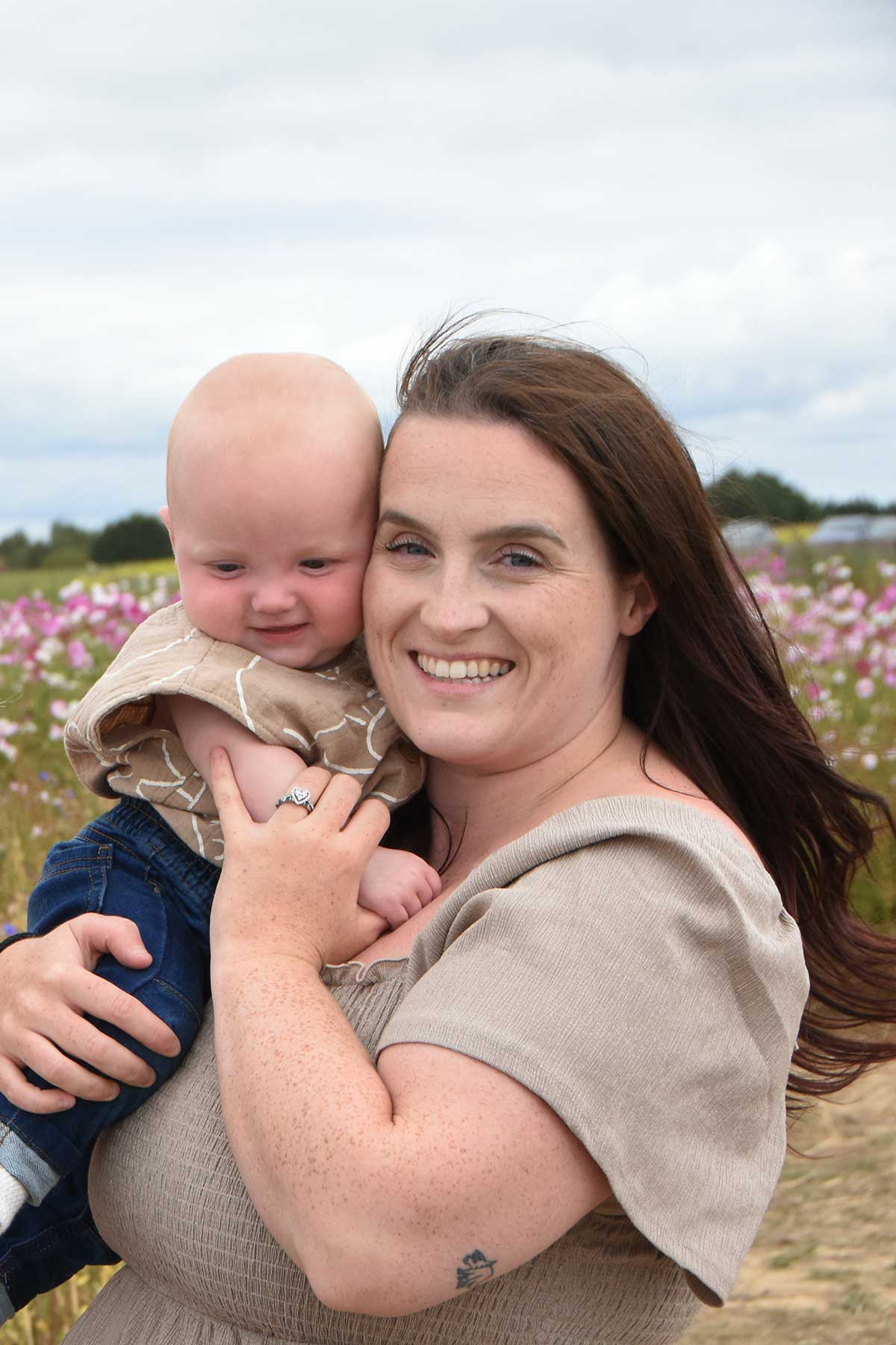 Mother and baby. Wild flower background 